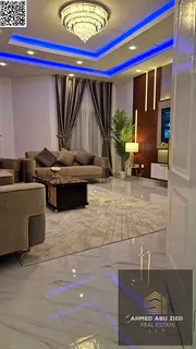 Two bedrooms, a large living room, a spacious kitchen, two bathrooms, central air conditioning, full