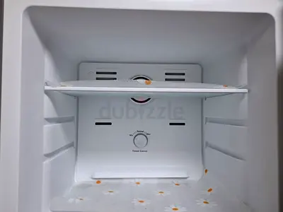 Small single-door fridge interior - good working condition