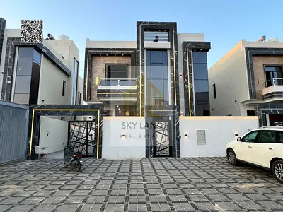 Villa for sale in Al Helio 1, Ajman, 5 master bedrooms, luxury finishing, near Mohammed Bin Zayed Road, area 3600 sq ft