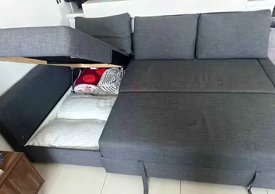 Ikea L shape sofa store cum bed and you can fix the storage