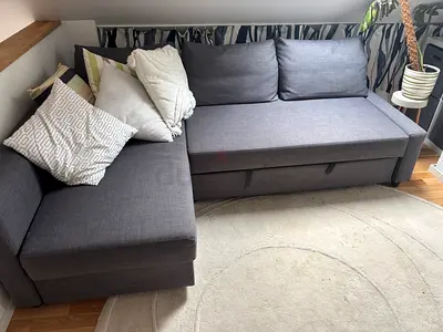 Gray L-shaped Sofa Bed with Storage - Good Condition