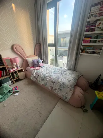 Single toddler bed with mattress and nursery decor (pink) - good condition