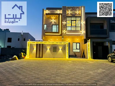 Villa for sale, including registration and ownership fees, near all services, close to Sheikh Mohammed Bin Zayed Road, on a main street, very prime lo