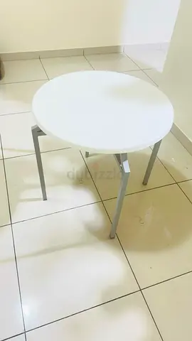 Small Round White coffee Table with Metal Legs.