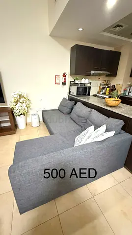 Grey Fabric 2-Seater Sofa - Good Condition (500 AED)