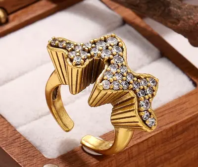 Gold-tone statement ring with crystal pavé design