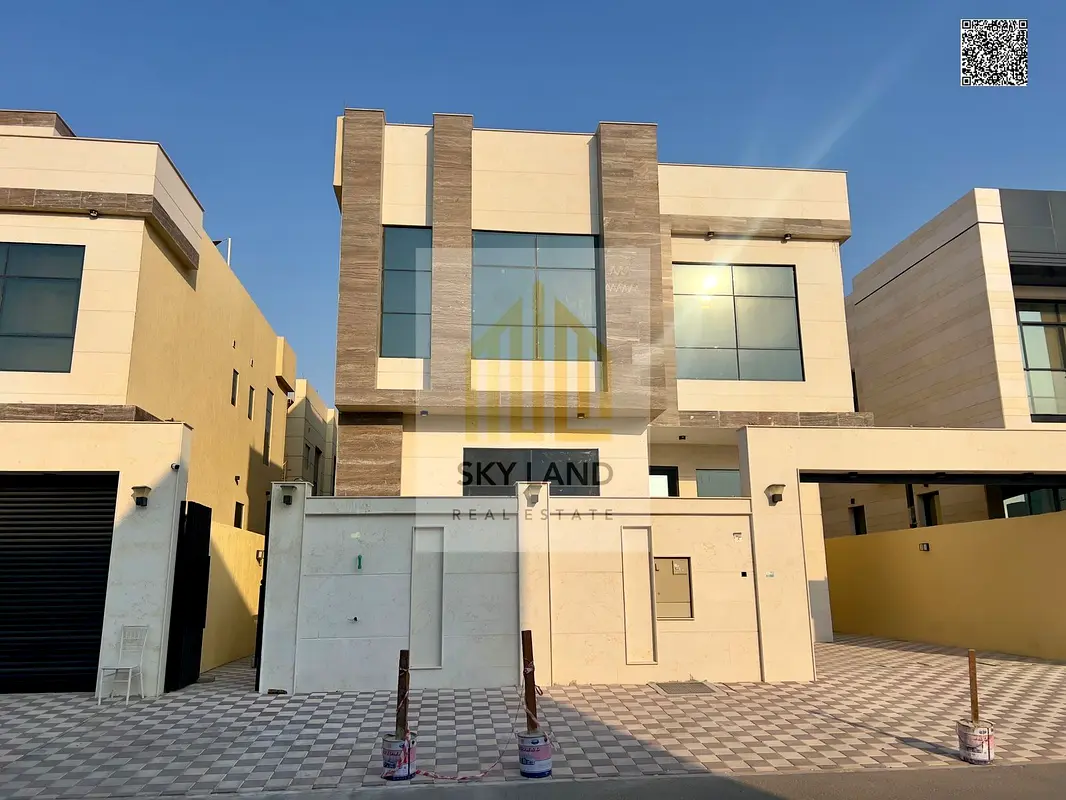 A luxury villa with a modern design for sale in the Al Yasmeen area - Ajman, including air conditioning, two floors and a roof