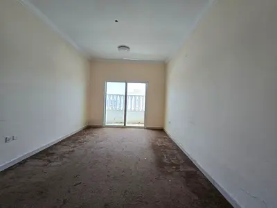 For annual rent in Al Jurf 3, Ajman: 2 bedrooms and a living room, 3 bathrooms, 2 master bedrooms, separate living room, central air conditioning.
