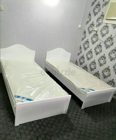 Pair of White Single Beds with New Mattresses each one