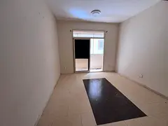 For annual rent in Al Jurf 2, Ajman: one bedroom and living room, two bathrooms, balcony, central ai