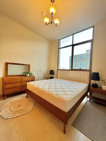 Wooden bed frame with super firm mattress and matching nightstands along with dresser  mirror