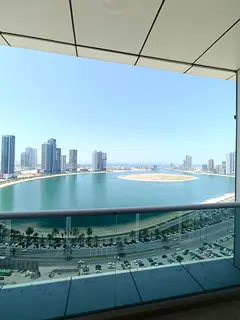 Apartment for rent in Al Khan Sharjah three master bedrooms hall with balcony open view kitchen maid