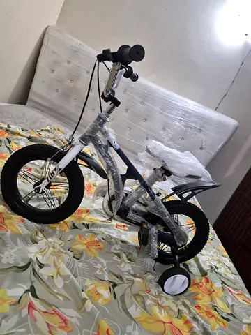 Kids 14-inch Training Bike with Removable Training Wheels — New Condition Never used.