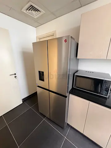 Hoover Stainless Steel Large Double-Door Refrigerator with Water Dispenser - Good Condition
