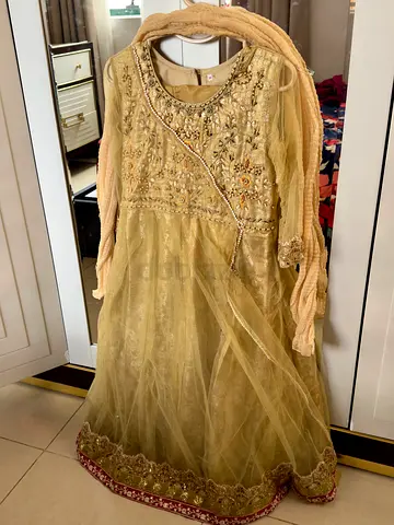 2 Light gold embroidered girls party dresses (traditional) - size 34 and 36 one dress 30 dirhm