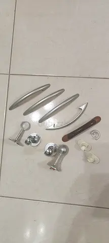Assorted cabinet and drawer handles + knobs (used) - set of pieces
