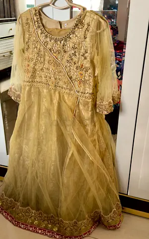 2 Light gold embroidered girls party dresses (traditional) - size approx 8 years  10 years.
