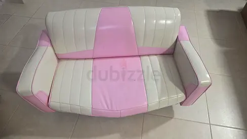 Pink and white 2-seater vinyl sofa - good condition
