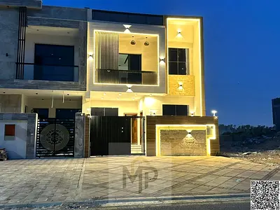 Townhouse in Al Yasmin, freehold, all utilities included, registration and ownership fees included, no service charges.