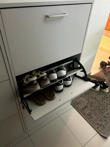 Slim White Shoe Cabinet with Drop-Down Compartments