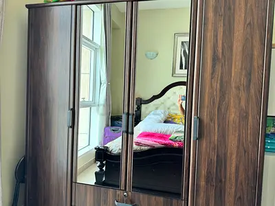 Dark Wood 4-Door Wardrobe with Mirrored Middle Panels