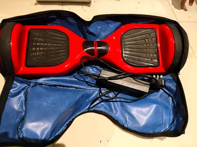Red Self-Balancing Hoverboard with Carry Case and Charger - Good Condition