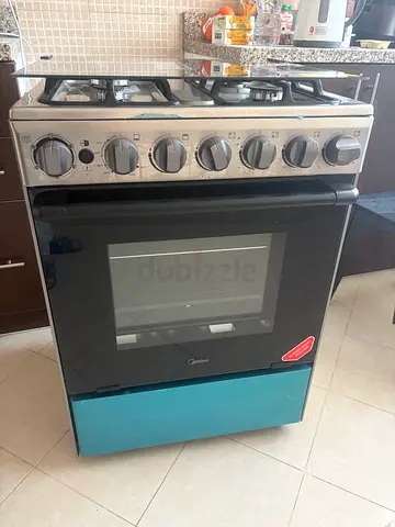 Midea freestanding Gas Cooker (Stainless Steel) - Good Condition