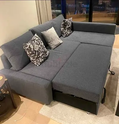 Grey L-shaped Sofa Bed with Pull-out Storage — Good Condition