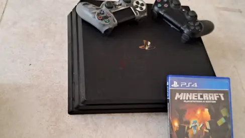 Ps4 pro with 2 working controlers and a minecraft CD