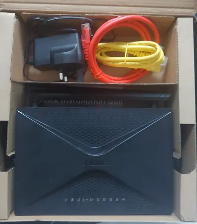 D-Link Wi-Fi Router with Power Adapter and Ethernet Cables