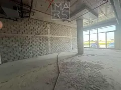 Premium commercial shops available for rent in "Ajmal Makan" compound, located in a vibran