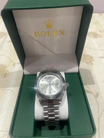 Rolex Oyster Perpetual Datejust mens stainless steel watch with silver dial