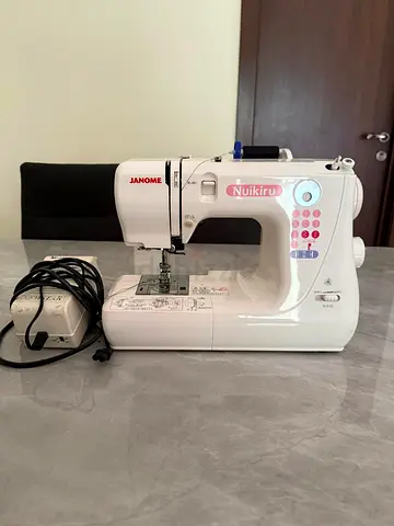 Janome Nuikiru Sewing Machine - Light Use, Good Working Condition