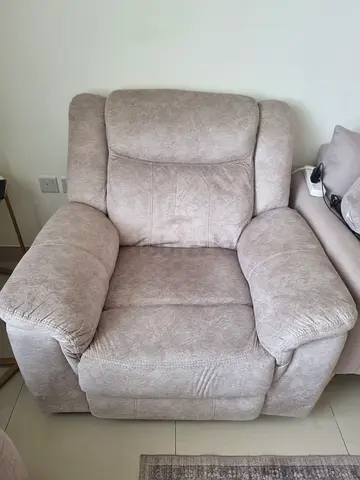 Comfortable single beige recliner armchair - good condition