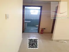 An opportunity for investors: A residential building for sale in Al Rawda 3, located on an asphalt r