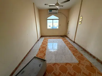 Two-bedroom apartment with a living room, second row from Ajman Corniche