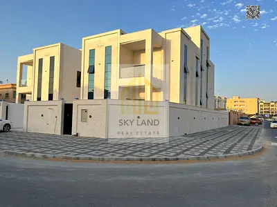 Corner villa in Al Rawdah, prime location, fully air-conditioned, freehold ownership for all nationalities
