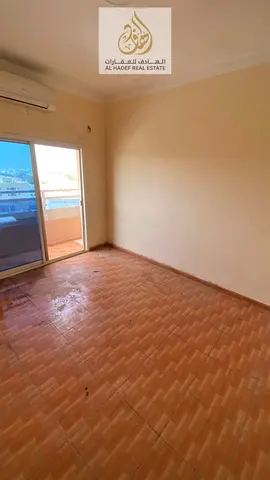 Annual rent in Ajman, Al Rawda 2, near Layali Beirut and Kenz Hypermarket. The building is for families. It features a bedroom, living room, separate