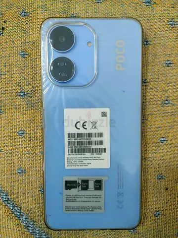 POCO C65 smartphone in good condition - blue, dual camera (with stickers)