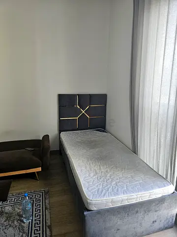 2 X Single bed frame with mattress and upholstered headboard - good condition Price for 2 beds 280