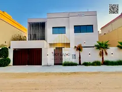A stunning villa with a swimming pool, comprising 5 master bedrooms with built-in wardrobes and a ro