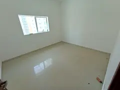 Available now for annual rent in Al Taawun area, Sharjah: a one-bedroom apartment with a living room