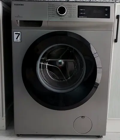 Toshiba washing mashine fully automatic in pristine condition for sale.Whatsapp no calls.