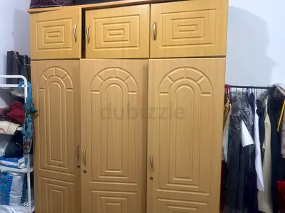 3-door freestanding wardrobe with overhead storage - light wood finish
