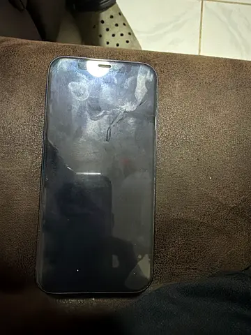 iPhone with screen smudges - good working condition