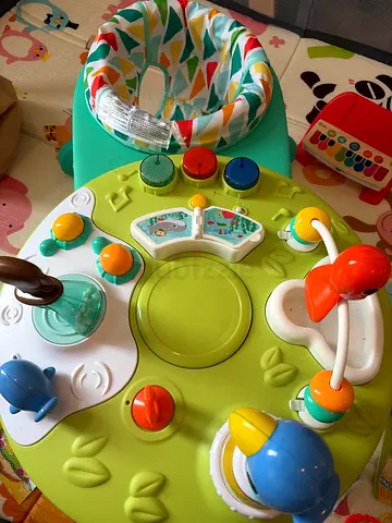 Baby activity jumper/exersaucer with detachable toys - good condition
