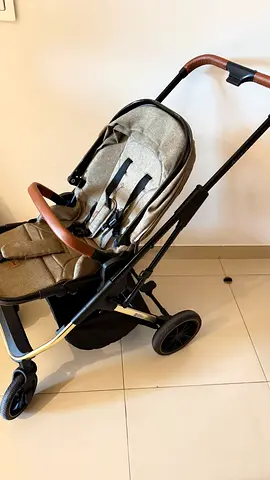 Lightweight 4 Wheel Stroller in Beige with Leather Handle - Good Condition.