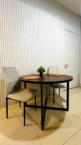 Compact round dining table 4 seater with two chairs - modern black frame