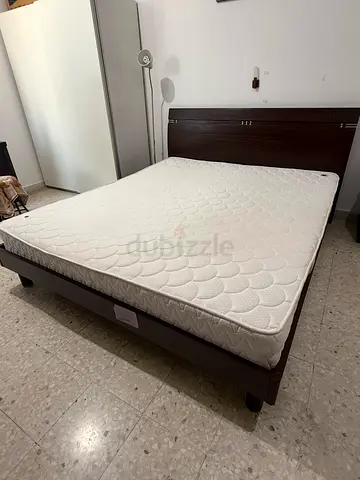 King size bed frame with mattress - dark wood