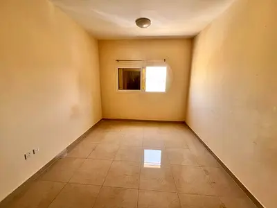 For annual rent in Al Jurf 3, Ajman: a brand new studio apartment, second occupant, semi-separate k